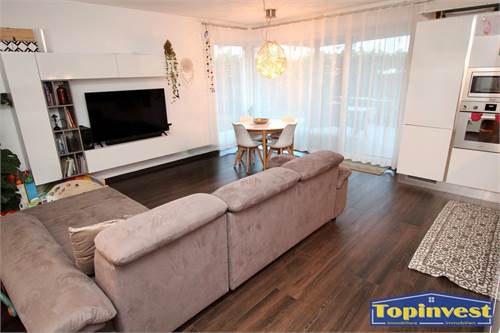 Trilocale seminuovo con giardino